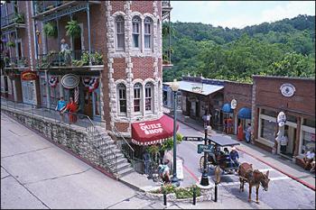  Secluded and peaceful with winding mountainside streets, Eureka Springs, AR has a flair like no other town. In fact, the National Trust for Historic Preservation named Eureka Springs, AR as one of its Dozen Distinctive Destinations. Streets are lined with Victorian homes hugging cliffsides, and its entire downtown area is on the National Register of Historic Places.

Eureka Springs, Arkansas has block after block of one-of-a-kind shops, boutiques, fine art galleries, craft emporiums, spas, museums and restaurants. Festivals and events span everything from blues, jazz and opera to car shows to UFOs, antiques and the arts. Top-name entertainers perform at The Auditorium. each year. Eureka is also home to several music variety shows. Trolley and carriage rides are a popular way to see the city. Historic hotels and unique bed and breakfast inns, hotels and cabins accommodate visitors.